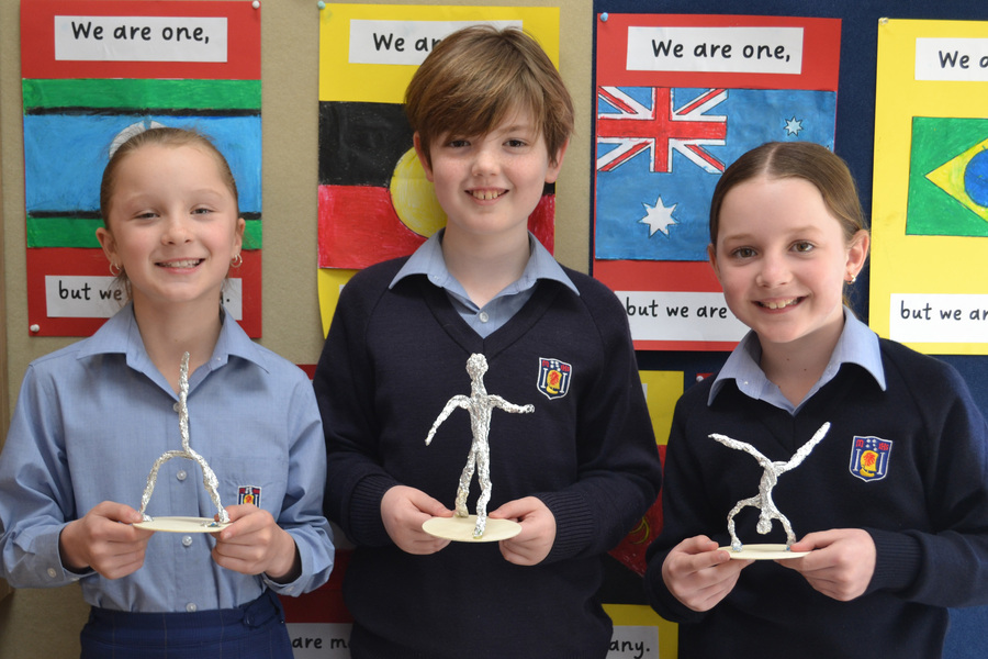 ART > Our Year 3s caught the Olympic spirit last week, creating these alfoil structures depicting the different sports in the games. Pictured are Amahli, Ethan and Dillon.