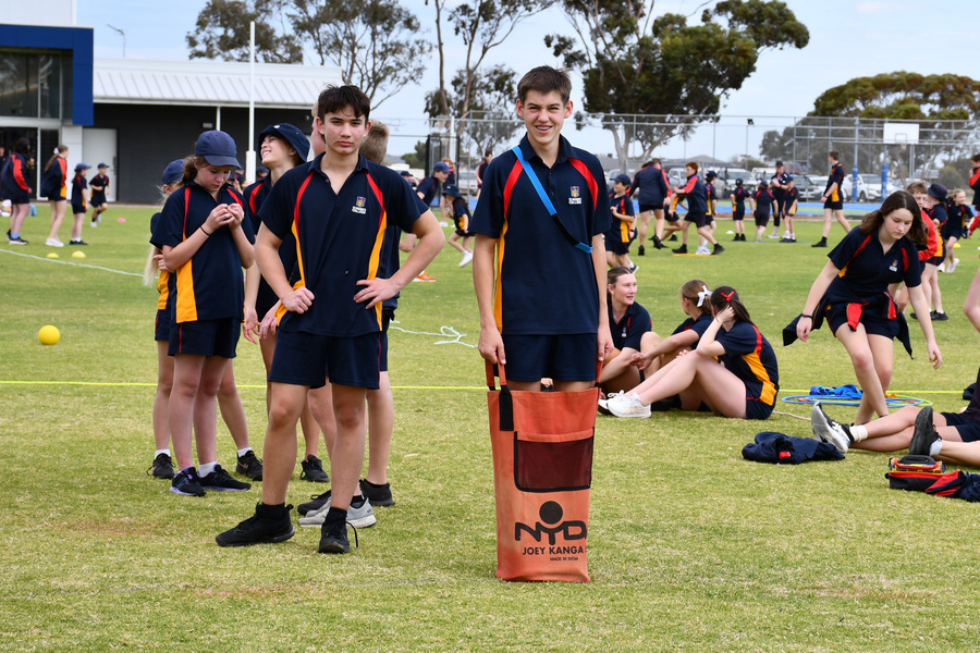 FEAST DAY > Cooper is ready to take off in the sack race.