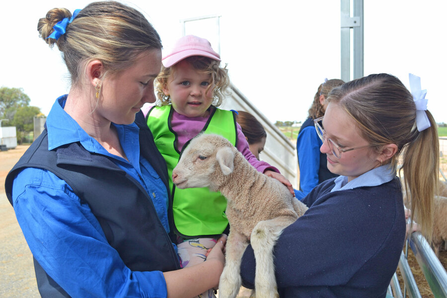 AG OPEN DAYS > Eliza visiting the farm (from Edge Learning Centre). She is pictured with Annabelle and Emma.