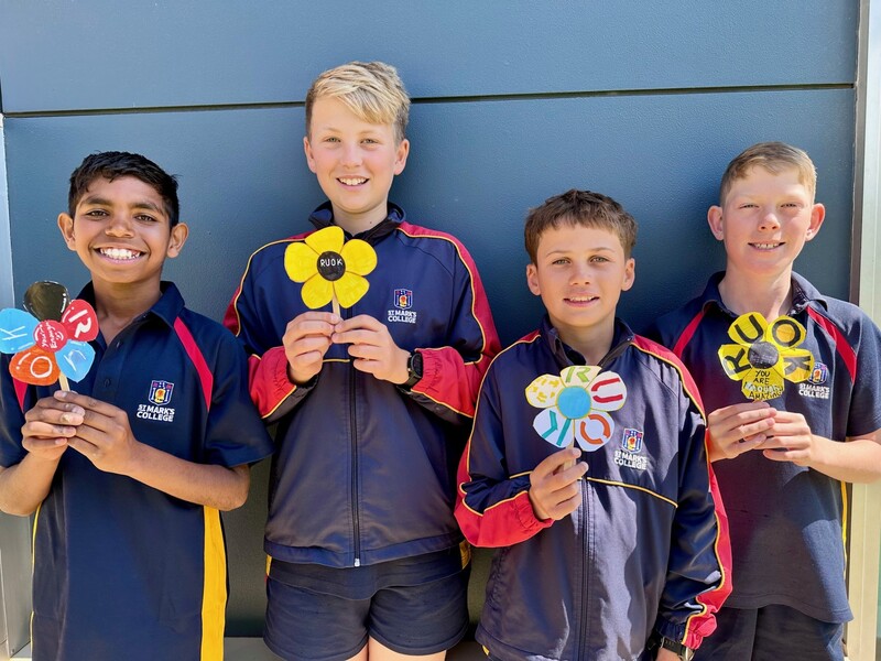 Gilbert, Parker, Luca and Max with their R U OK? flowers