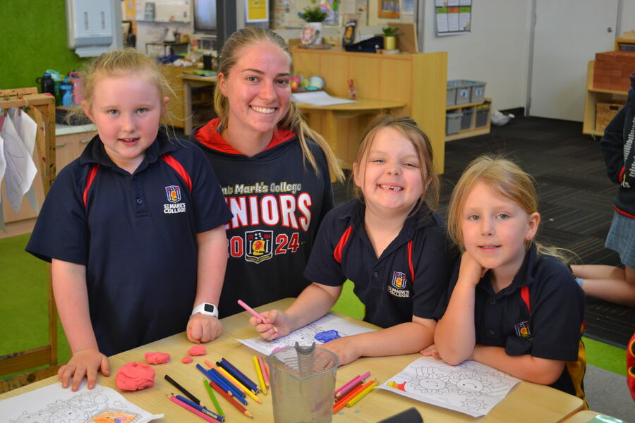 BUDDIES > Year 12 students celebrated the end of term with their Reception Buddies.