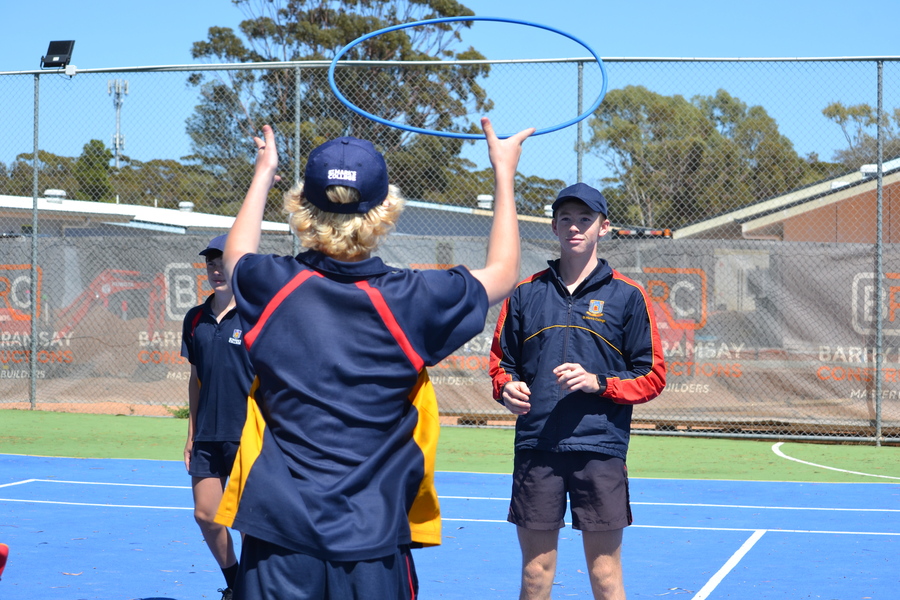 WRAP > Year 8s and their Year 11 Buddies playing human quoits.