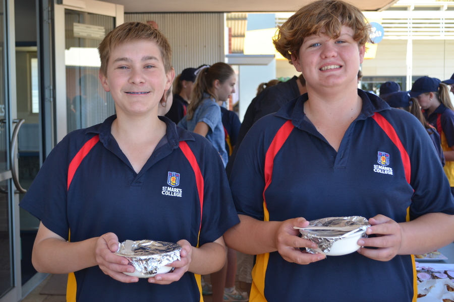 HOME EC > Year 10 students prepared a range of treats for a bake sale last week. Pictured is Kobi and Lachlan selling hot potatoes.