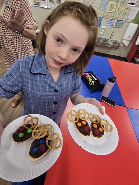 INCLUSIVE ED > Layla, as part of the Cooking Group, made reindeer biscuits!