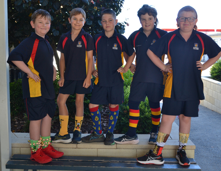 COMMUNITY > Celebrating Socktober with Crazy Socks Day raising money for Catholic Missions.