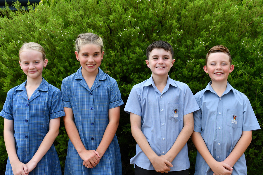 LITURGY > Our 2025 School Captains were announced at the End of Year Liturgy. Congratulations to Indiana and Darby (School Captains, centre) and Harper and Fletcher (School Vice-Captains, right and left).