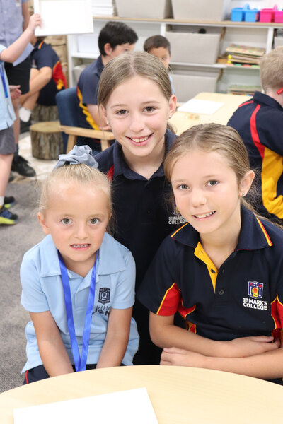 BUDDIES > Year 5 students Annabelle and Erin enjoyed meeting their Little Lions Buddy Zimi.