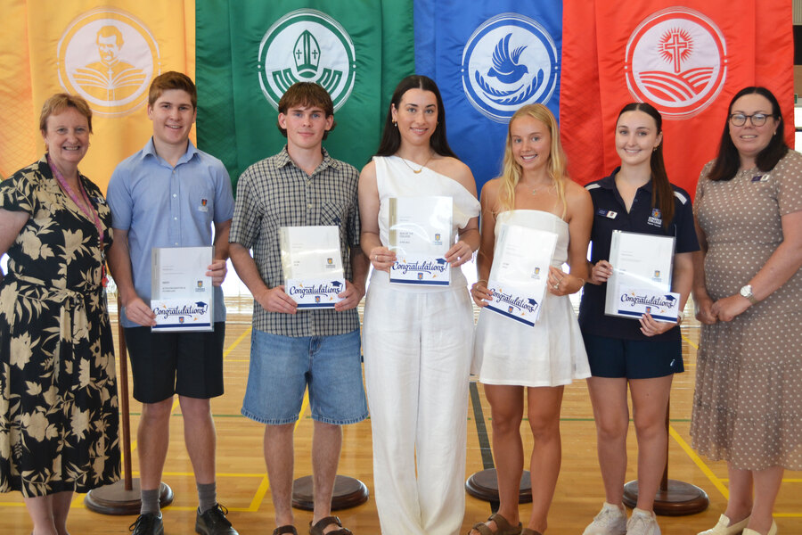 DUX > We celebrated excellent academic achievement at our Dux Assembly. Pictured is Dr Hewson, Mitchell Court, Adam Wegner, Zara Pansini, Jessica Doyle, Addison Roberts and Mrs Pole.